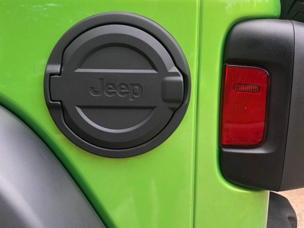 Mopar Jeep Wrangler Fuel Door with Jeep Logo; Black 82215123AB (18