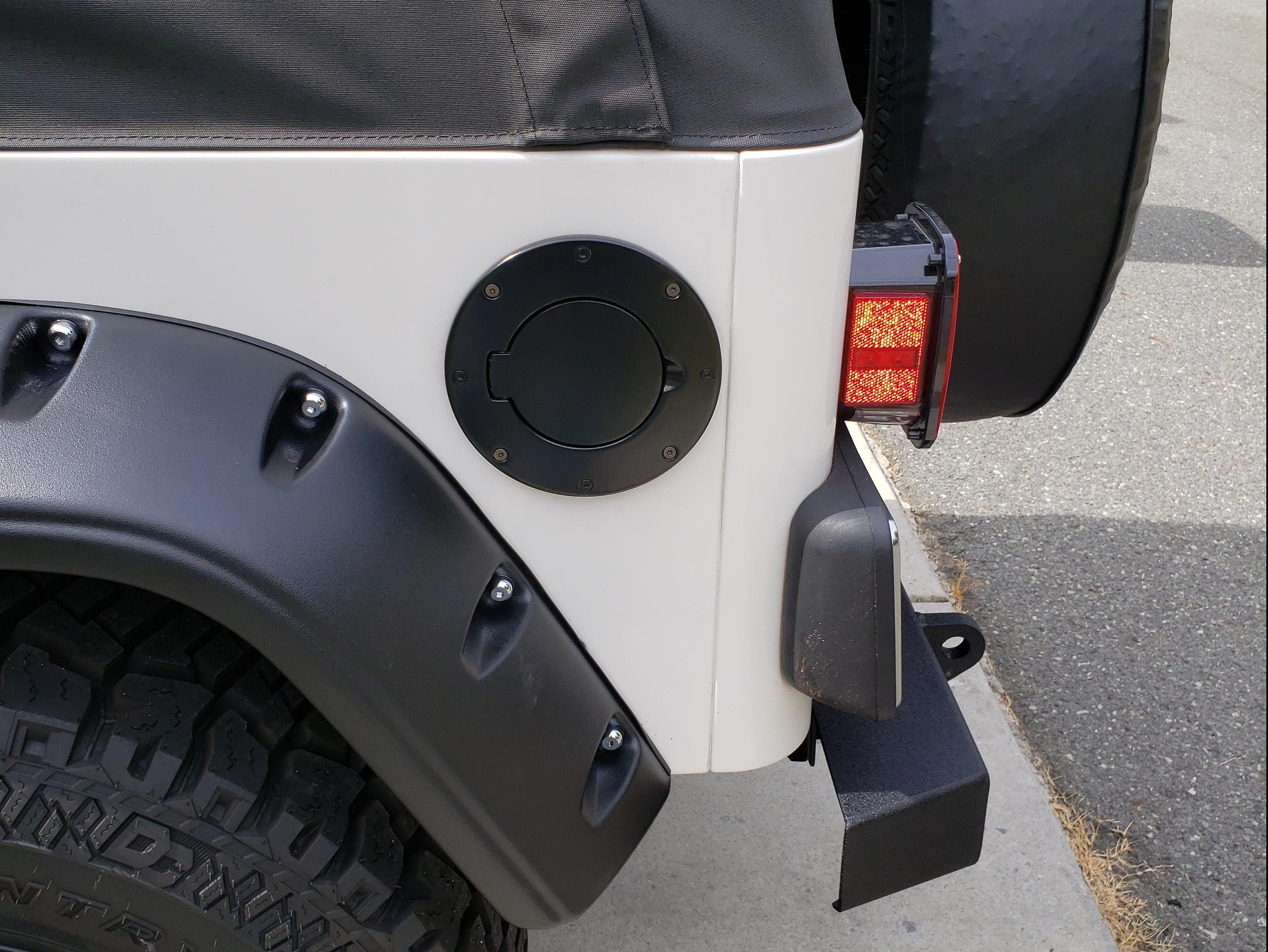 Smittybilt Jeep Wrangler Gas Cover - Billet Style - Gloss Black