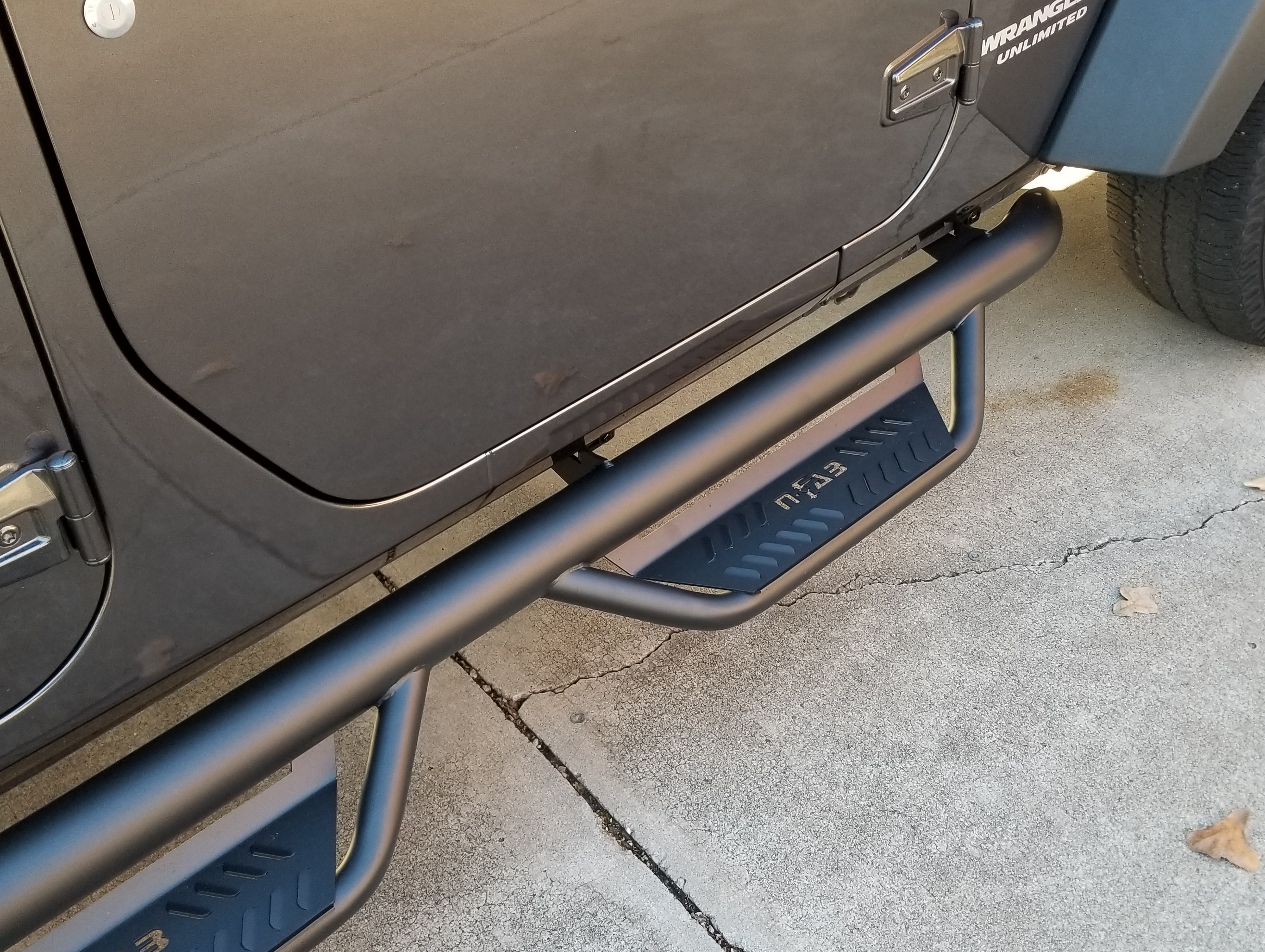 RT N-Fab Cab Length Podium Nerf Side Step Bars; Textured Black