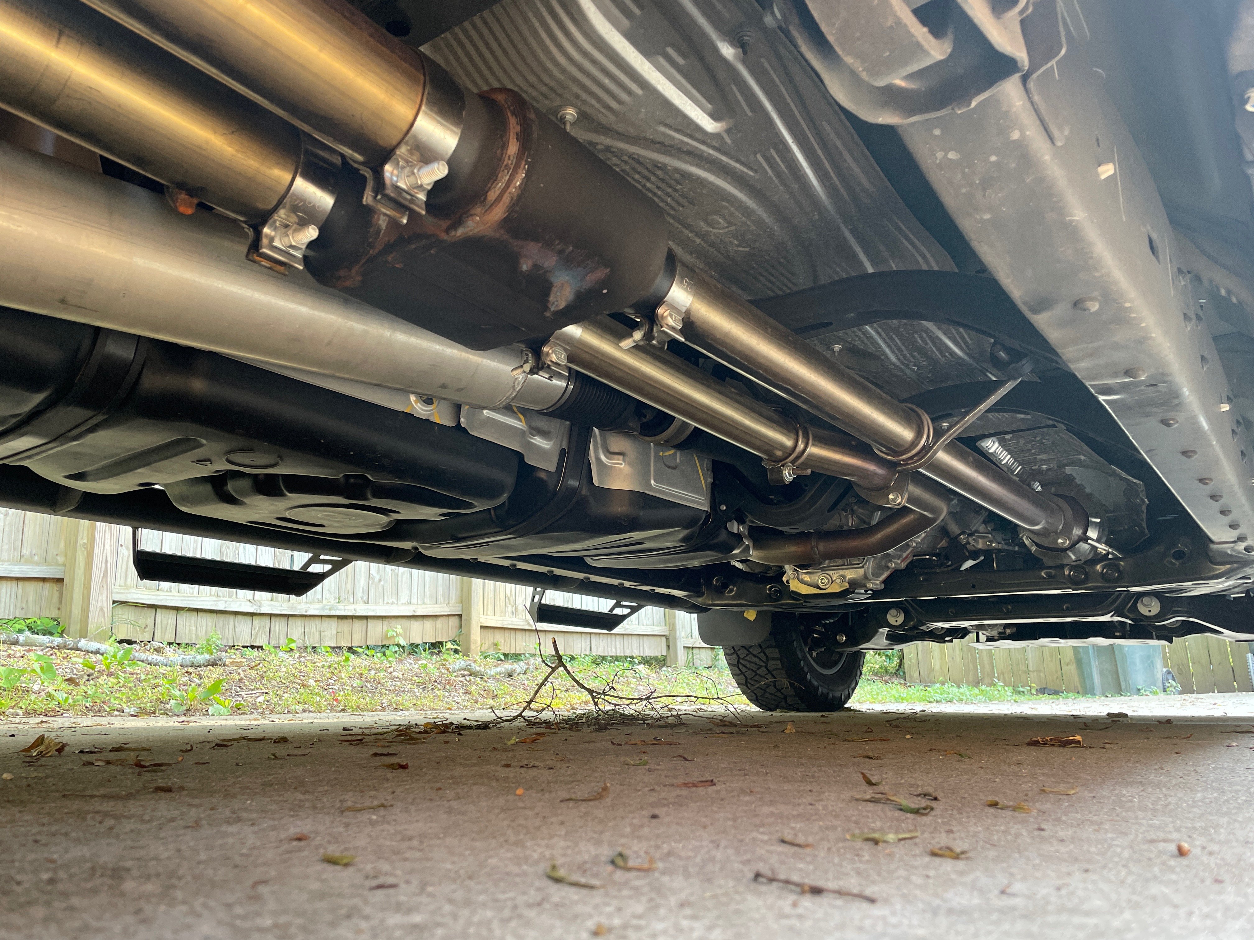 Flowmaster Tundra Outlaw Dual Exhaust System with Black Tips; Side
