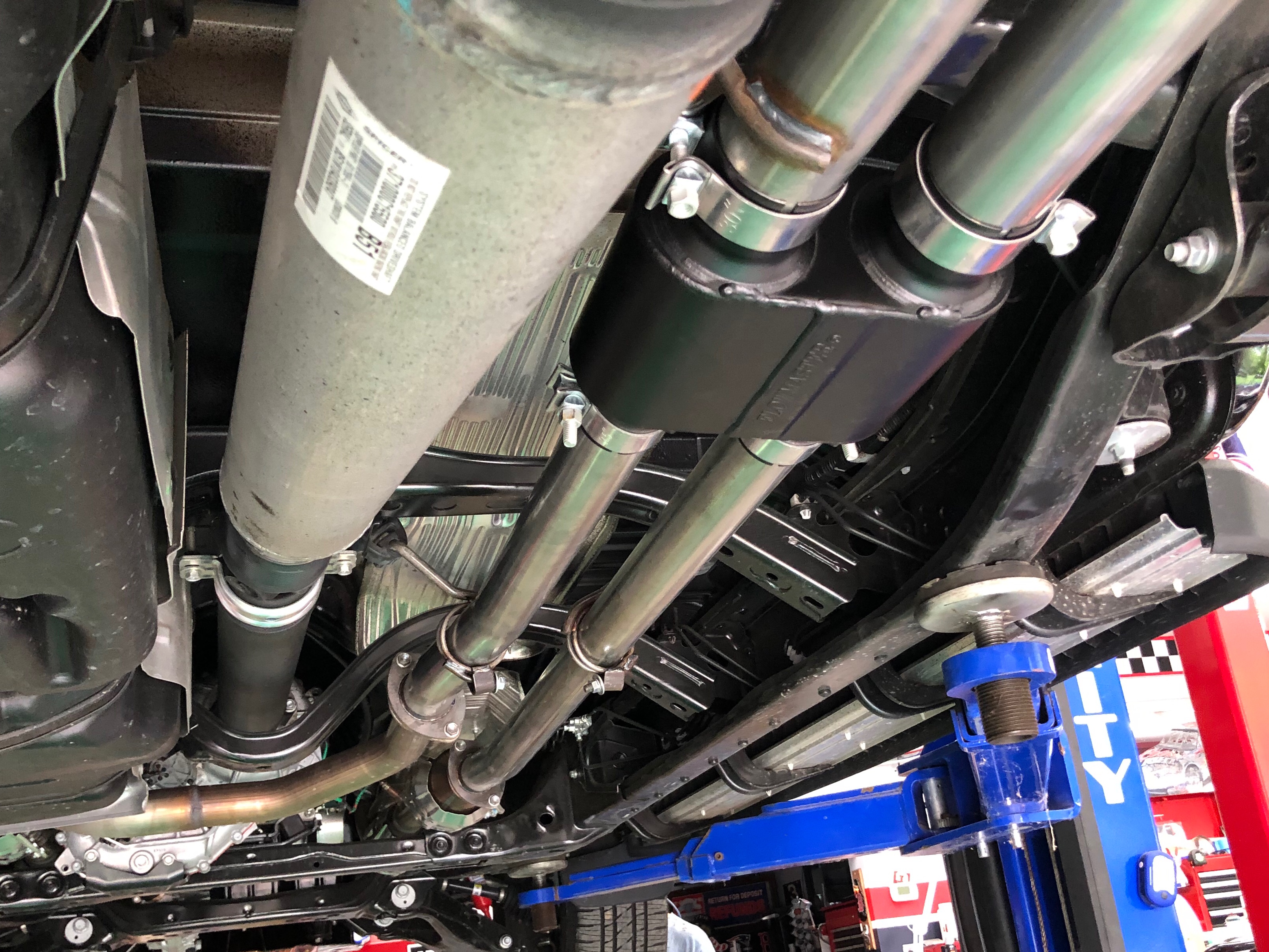 Flowmaster Tundra Outlaw Dual Exhaust System with Black Tips; Side