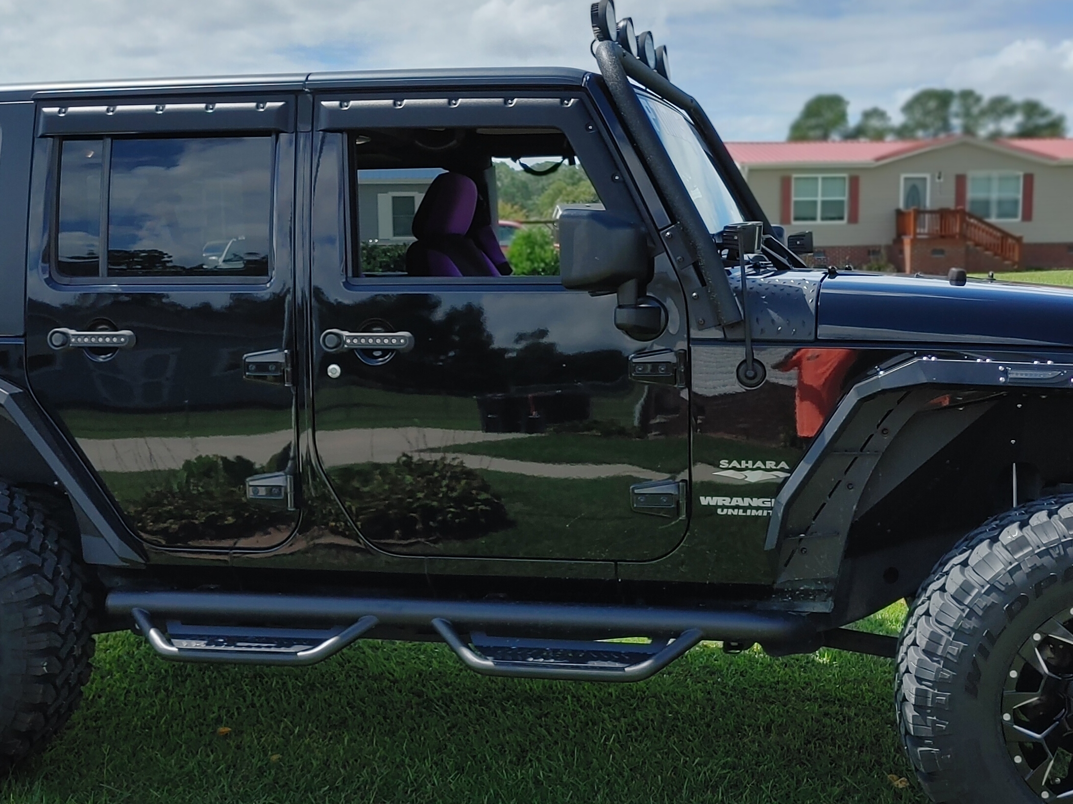 RT N-Fab Cab Length Podium Nerf Side Step Bars; Textured Black