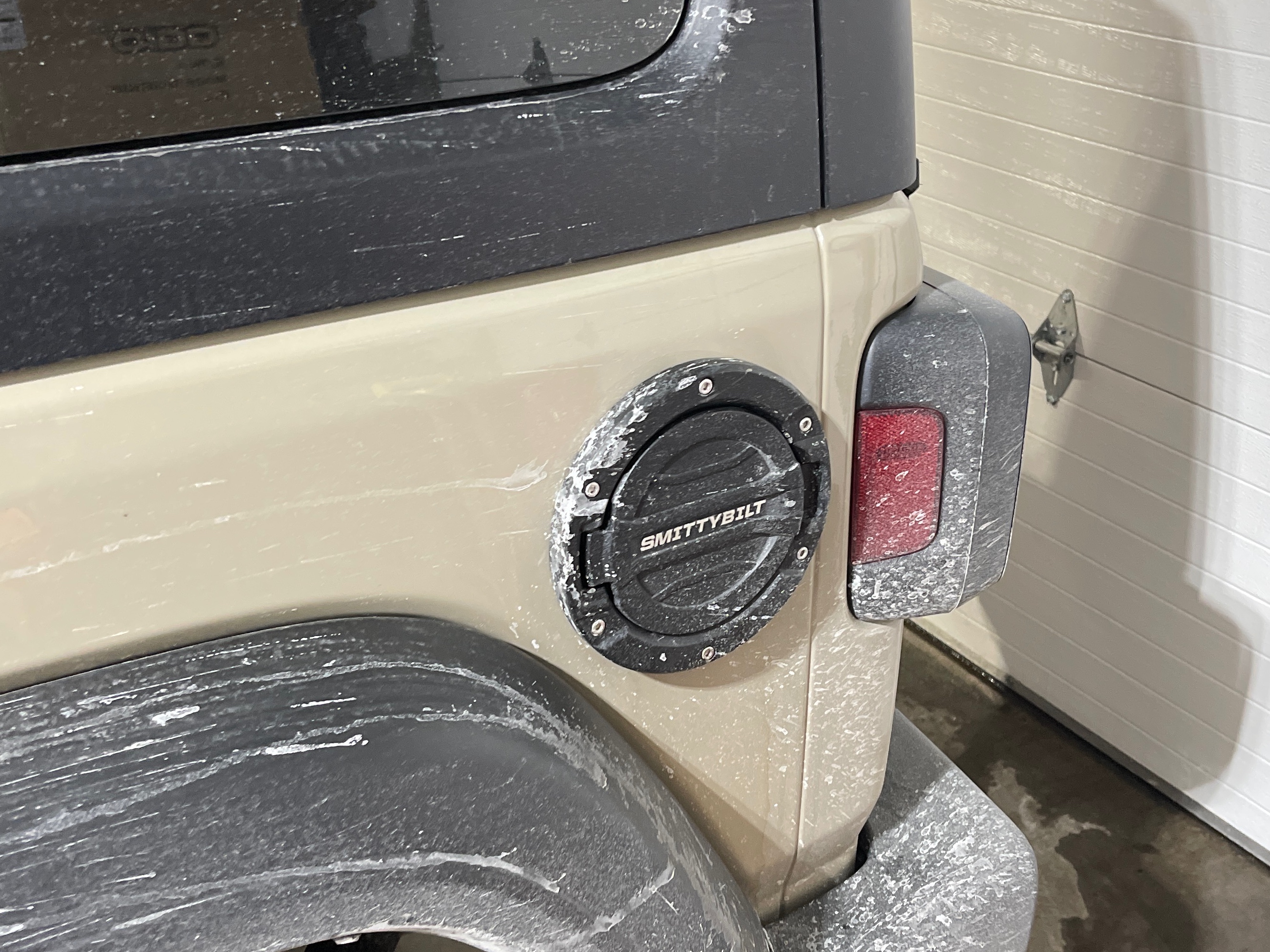 Smittybilt Jeep Wrangler Billet Style Gas Cover; Textured Black